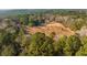 Secluded home site with a large expanse of land and verdant pine and hardwood forest at 2042 Highway 402, Moncks Corner, SC 29461