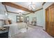 Bright bedroom featuring exposed wooden beams and light-colored walls, creating a warm and inviting atmosphere at 2042 Highway 402, Moncks Corner, SC 29461