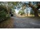 Driveway leading to the house with the garage in view at 2042 Highway 402, Moncks Corner, SC 29461