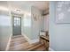 Charming entryway featuring bench seating, storage baskets, and decorative hooks for coats and hats at 2042 Highway 402, Moncks Corner, SC 29461