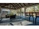 Relaxing gazebo interior featuring comfortable seating with views of the pond at 2042 Highway 402, Moncks Corner, SC 29461