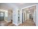 Hallway leads into rooms, revealing a mirror and entryway with bench seating and storage baskets at 2042 Highway 402, Moncks Corner, SC 29461