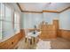 Inviting home office featuring natural light, hardwood floors, and decorative wood trim at 2042 Highway 402, Moncks Corner, SC 29461