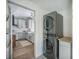 Well-equipped laundry area with modern washer/dryer unit adjacent to an open kitchen at 2042 Highway 402, Moncks Corner, SC 29461