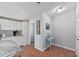 This kitchen area features a lovely accent table next to a picture of a cow and a light brown floor at 208 Langham Ct, Moncks Corner, SC 29461