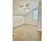 Neutral attic space with window, carpeted floor and ceiling fan at 2136 Baldwin Park Dr, Mount Pleasant, SC 29466