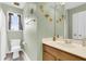 Cute bathroom featuring toilet, sink, and small window at 2136 Baldwin Park Dr, Mount Pleasant, SC 29466