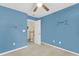 Colorful blue bedroom with ocean themed decorations, and a connecting doorway at 2136 Baldwin Park Dr, Mount Pleasant, SC 29466