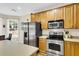 Bright kitchen with stainless steel appliances, ample cabinetry, and convenient center island at 2136 Baldwin Park Dr, Mount Pleasant, SC 29466