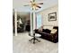 Inviting living room with a ceiling fan, decorative columns, and open access to the dining area at 2136 Baldwin Park Dr, Mount Pleasant, SC 29466