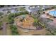 Aerial view showcasing the community playground, featuring modern play structures, benches, and a landscaped surround at 2136 Baldwin Park Dr, Mount Pleasant, SC 29466