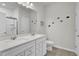 Bathroom featuring double vanity sinks, a large mirror, and a separate shower with glass door at 222 Hayworth Rd, Summerville, SC 29486
