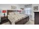 Cozy bedroom with a seashell themed bedding set, wooden furniture, and soft natural light at 222 Hayworth Rd, Summerville, SC 29486