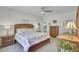 Bright bedroom featuring a floral-patterned bed, matching nightstands, and ample natural light at 222 Hayworth Rd, Summerville, SC 29486