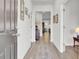 Inviting foyer with hardwood floors, neutral walls, and elegant decor leading into the home at 222 Hayworth Rd, Summerville, SC 29486