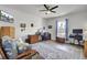 Cozy living room featuring wood floors, stylish furnishings, ceiling fan, and a bright window at 222 Hayworth Rd, Summerville, SC 29486