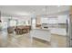 Bright and open living space with kitchen island, dining area, and cozy living room at 222 Hayworth Rd, Summerville, SC 29486