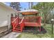Inviting back deck with a gazebo and manicured landscaping provides a relaxing outdoor retreat at 227 Lipman St, Summerville, SC 29483