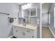 Bathroom with a vanity, mirror, and views into the connected bedroom at 227 Lipman St, Summerville, SC 29483