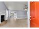 Bright living room featuring neutral paint, fireplace, ceiling fan, and sliding doors to the backyard at 227 Lipman St, Summerville, SC 29483