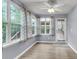 Sunroom with lots of windows and natural light at 227 Lipman St, Summerville, SC 29483