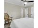 A view to a bedroom that offers a ceiling fan and a classic wooden chair at 237 Cypress Dr, Walterboro, SC 29488