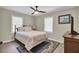 Bedroom featuring light walls, ceiling fan, and stylish decor for a cozy space at 237 Cypress Dr, Walterboro, SC 29488