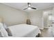 Bright bedroom with light walls, a ceiling fan and view to en suite bathroom at 237 Cypress Dr, Walterboro, SC 29488