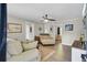 Cozy living room features neutral tones, ceiling fan, and an open layout at 237 Cypress Dr, Walterboro, SC 29488
