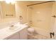 Bathroom featuring a tub/shower combo, tile floors, standard vanity, and accessories at 2402 Riverridge Ct, Moncks Corner, SC 29461