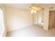 Bright bedroom featuring mirrored closet doors, neutral carpet, and a window with blinds at 2402 Riverridge Ct, Moncks Corner, SC 29461