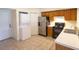 Bright kitchen with stainless steel appliances, white countertops, and tile flooring at 2402 Riverridge Ct, Moncks Corner, SC 29461