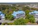 Exterior shot of the complex showing multiple levels, balconies and landscaping around the building at 2413 Racquet Club Dr, Seabrook Island, SC 29455