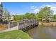 The complex is complete with ponds and wooden bridges throughout the community at 2413 Racquet Club Dr, Seabrook Island, SC 29455