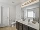 Bright bathroom with double sinks, and natural light at 243 Donatella Dr, Goose Creek, SC 29445