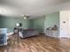 Spacious living room featuring hardwood floors, neutral paint, and a ceiling fan at 243 Donatella Dr, Goose Creek, SC 29445