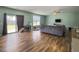 Bright living room with sliding glass doors, hardwood floors, and natural light at 243 Donatella Dr, Goose Creek, SC 29445