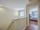 Hallway view of bedroom with tray ceiling and hardwood flooring at 255 Longford Dr, Summerville, SC 29483