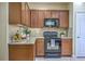 Kitchen with granite countertops, stylish backsplash, and stainless steel appliances at 255 Longford Dr, Summerville, SC 29483