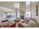 Open-concept living area with a fireplace, sofas, and adjacent dining space at 255 Longford Dr, Summerville, SC 29483