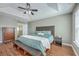 Spacious main bedroom with hardwood flooring, tray ceiling and sitting area at 255 Longford Dr, Summerville, SC 29483