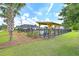 Community pool area featuring a shaded cabana and tropical palm trees at 255 Longford Dr, Summerville, SC 29483