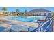 Community pool area featuring lounge chairs, tables, and a spacious pool for residents at 255 Longford Dr, Summerville, SC 29483