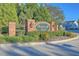 The Wentworth Hall community entrance features a brick sign with manicured landscaping at 255 Longford Dr, Summerville, SC 29483