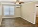 Bedroom with tile flooring features a window with blinds at 259 E. Bay St # 1A, Charleston, SC 29401