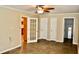 Spacious bedroom shows doors leading to other parts of home at 259 E. Bay St # 1A, Charleston, SC 29401