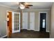Bedroom features doors leading to a kitchen and bathroom at 259 E. Bay St # 1A, Charleston, SC 29401