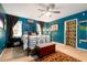 Cozy bedroom featuring a ceiling fan, a bed, and beautiful natural light at 29 Meander Row, Charleston, SC 29412