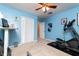 Bedroom featuring light-blue walls, closet, ceiling fan and exercise equipment at 29 Meander Row, Charleston, SC 29412