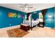 Comfortable bedroom with a ceiling fan, a bed, and colorful artwork at 29 Meander Row, Charleston, SC 29412